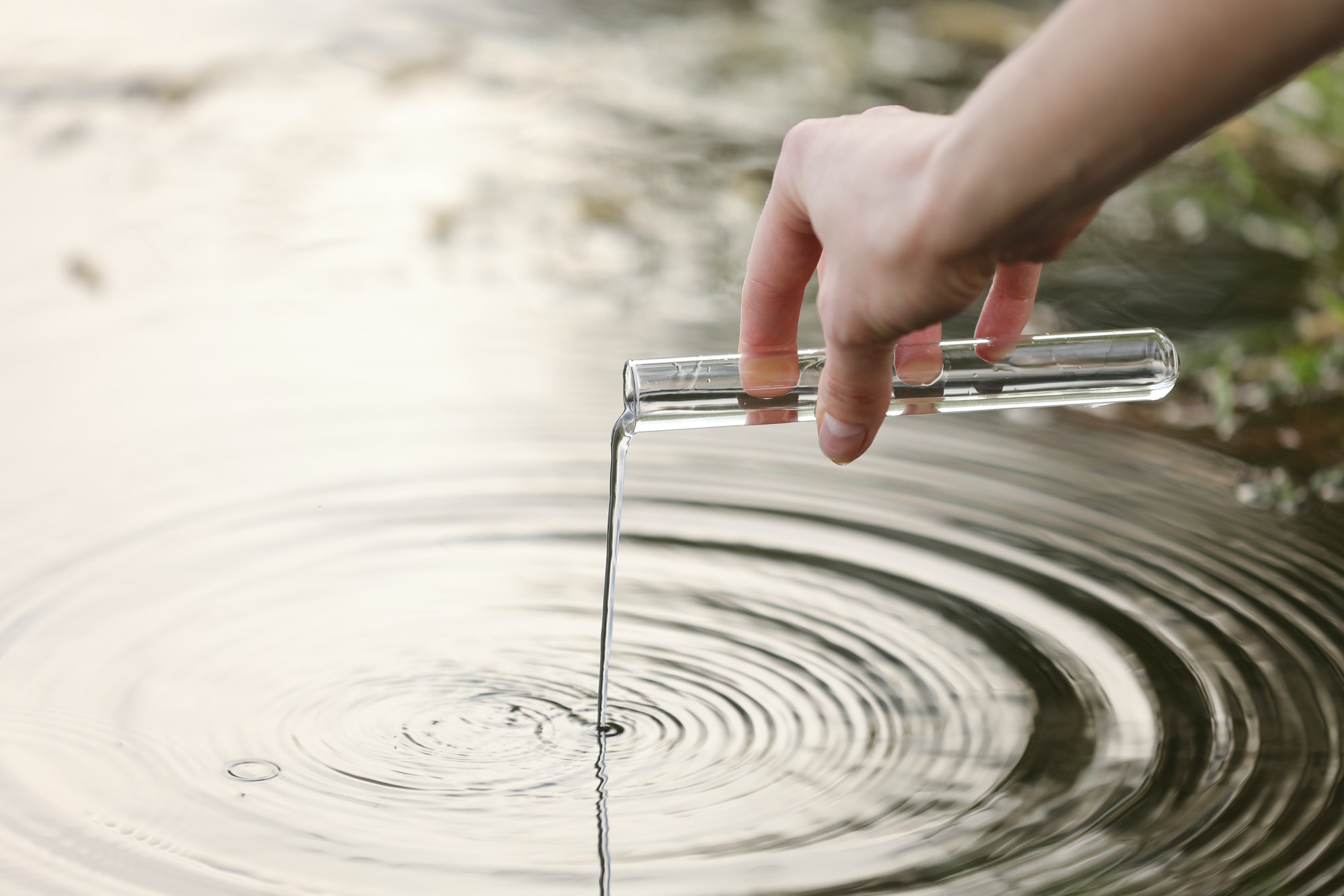 Water Regime engineer taking water samples
